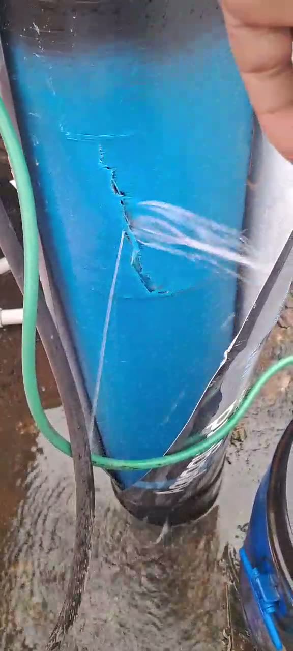 Water jetting from the crack in the Aquaguard water softener and pooling on the floor